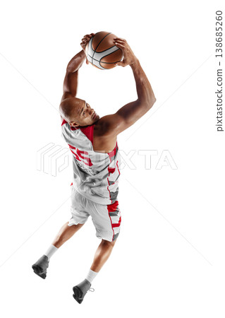 Basketball. Dynamic action shot of a basketball player performing an overhead throw from behind his head. Isolated 138685260