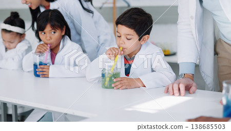 Study, science and kids in class for an experiment while learning chemistry together at school. Education, laboratory and innovation with student children in a classroom for growth or development Study, science and kids in class for an experiment while learning chemistry together at school. Education, laboratory and innovation with student children in a classroom for growth or development 138685503