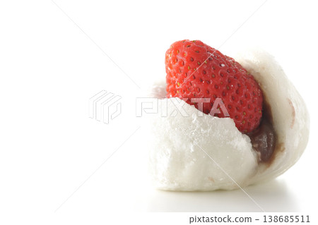 Strawberry daifuku photographed alone against a white background. Strawberry daifuku photographed alone against a white background. 138685511