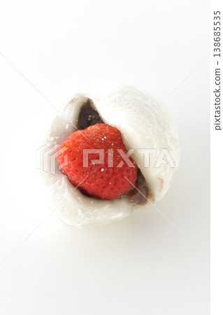Strawberry daifuku photographed alone against a white background. Strawberry daifuku photographed alone against a white background. 138685535