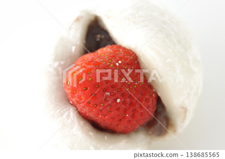 Strawberry daifuku photographed alone against a white background. Strawberry daifuku photographed alone against a white background. 138685565