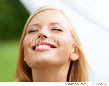 Happy, freedom and face of woman with fabric closeup in garden with clean linen, laundry or sheet in the wind. Natural, beauty and girl with a white cloth and happiness in house backyard or nature Happy, freedom and face of woman with fabric closeup in garden with clean linen, laundry or sheet in the wind. Natural, beauty and girl with a white cloth and happiness in house backyard or nature 138685597