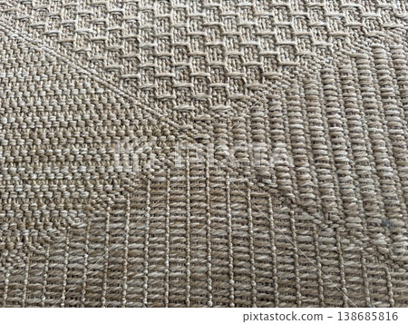 Woven texture of natural fiber mat suitable as background with geometric pattern elements 138685816
