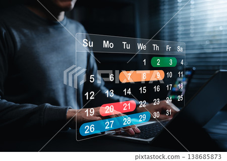 Schedule Planning and Calendar Management Concept. Man using laptop with virtual calendar. task scheduling, date planning, deadline tracking, time management, appointment reminder, work productivity Schedule Planning and Calendar Management Concept. Man using laptop with virtual calendar. task scheduling, date planning, deadline tracking, time management, appointment reminder, work productivity 138685873