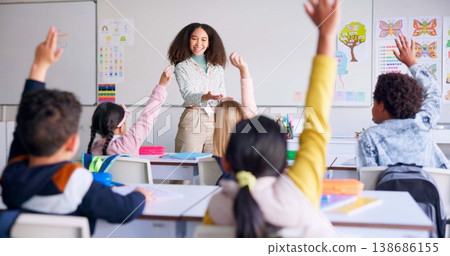 School, raised hand and woman teacher in classroom with kids for learning, discussion and knowledge. Help, studying and children students with questions for female educator or tutor for education. School, raised hand and woman teacher in classroom with kids for learning, discussion and knowledge. Help, studying and children students with questions for female educator or tutor for education. 138686155