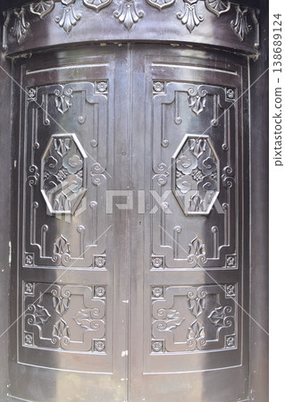 Fragment of antique Iron steel door England, Central Hong Kong. Old city background, retro style. Fragment of antique Iron steel door England, Central Hong Kong. Old city background, retro style. 138689124