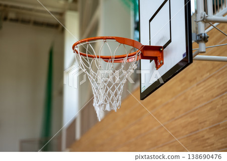 Basketball hoops installed on the walls of the gymnasium 138690476