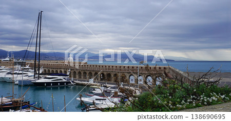 View of the famous Fort Carre and yachts at the Port Vauban in Antibes, France. View of the famous Fort Carre and yachts at the Port Vauban in Antibes, France. 138690695