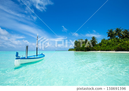 tropical Maldives island with white sandy beach and sea tropical Maldives island with white sandy beach and sea 138691396