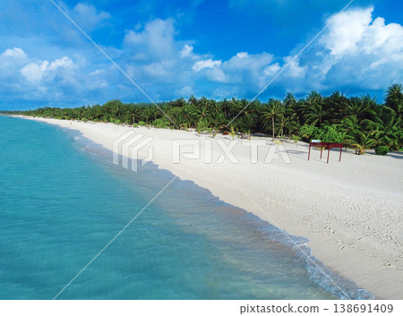 Amazing bird eyes view in Maldives. Sea beach. Tropical landscape. Amazing bird eyes view in Maldives. Sea beach. Tropical landscape. 138691409
