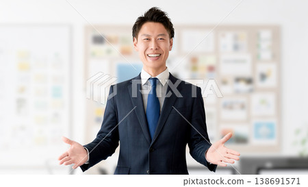 Smiling male businessman giving guidance Smiling male businessman giving guidance 138691571