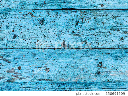 Texture of old wooden fence with blue peeling paint, abstract plank background Texture of old wooden fence with blue peeling paint, abstract plank background 138691609