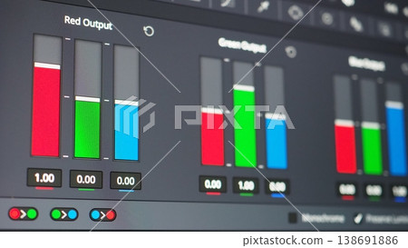 Color grading control panel. Close up of professional video color grading tools on a monitor. RGB waveform scopes hue controls color wheels adjustments. Editing post production and filmmaking concepts 138691886