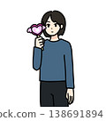 A woman standing with a penlight 138691894