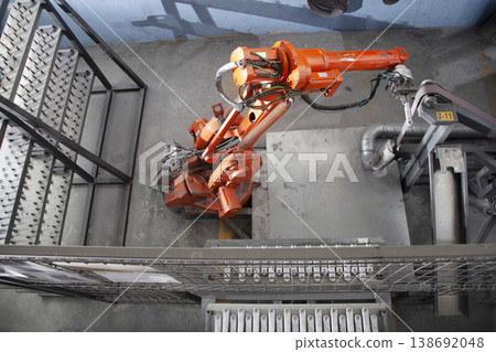Robotic arm at industrial manufacture factory. Robotic arm at industrial manufacture factory. 138692048