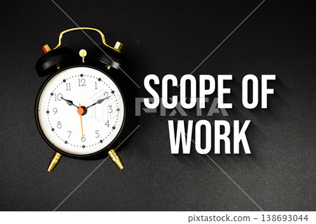 Scope Of Work text with alarm clock on black background Scope Of Work text with alarm clock on black background 138693044