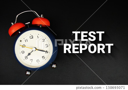 Test Report text with alarm clock on black background 138693071