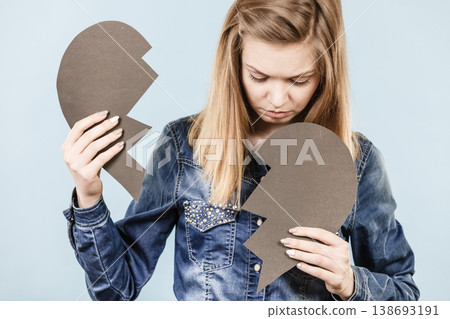Young woman with broken heart Young woman with broken heart 138693191