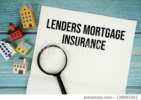 LMI Lenders Mortgage Insurance" with magnifying glass and house model on wooden background LMI Lenders Mortgage Insurance" with magnifying glass and house model on wooden background 138693261
