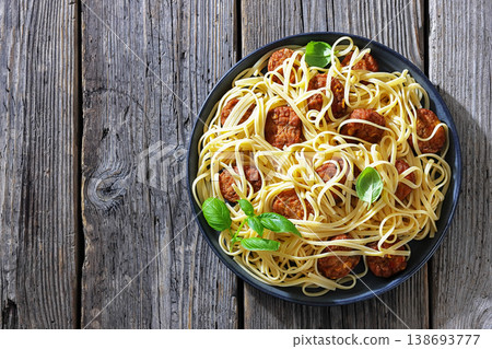 Pasta linguine with meatballs, pesto sauce, lemon Pasta linguine with meatballs, pesto sauce, lemon 138693777
