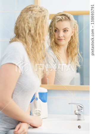 Woman with wet blonde hair Woman with wet blonde hair 138693791