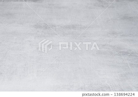 A blank gray concrete texture in a loft-style setting against a neutral background. 138694224