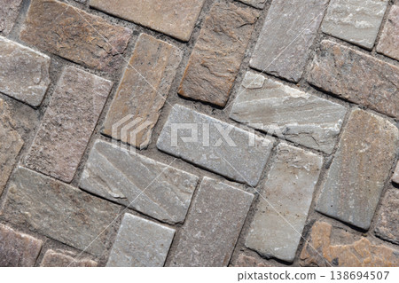 Close up of textured stone pavers, top viwq 138694507