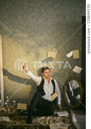 Vintage magician with floating pages and ornate background Vintage magician with floating pages and ornate background 138694530
