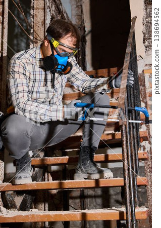 Professional evaluation of stair components and corrosion damage Professional evaluation of stair components and corrosion damage 138694562