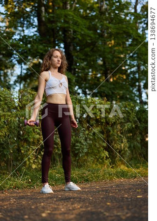 Natural light emphasizes relaxed posture and healthy lifestyle vibe Natural light emphasizes relaxed posture and healthy lifestyle vibe 138694677