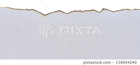 Torn edge of white blank sheet of paper with faded ends on isolated background Torn edge of white blank sheet of paper with faded ends on isolated background 138694840
