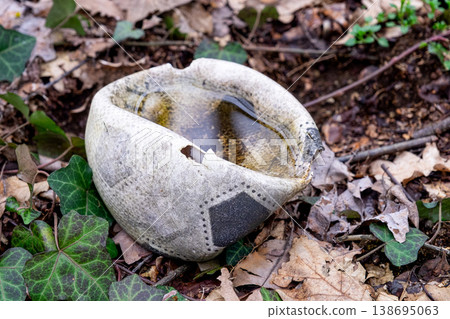 Old Deflated Soccer Ball Abandoned in the Woods Old Deflated Soccer Ball Abandoned in the Woods 138695063