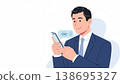 A businessman operating a smartphone 138695327