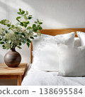 Cozy Bedroom Interior with Wooden Bed and Vase 138695584