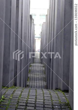 A passage between the concrete steles of the Holocaust memorial in Berlin. 138696012