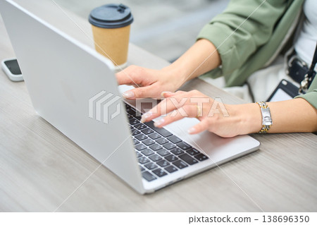 The hands of a woman who works as a programmer and coder at a foreign-owned IT company. The hands of a woman who works as a programmer and coder at a foreign-owned IT company. 138696350