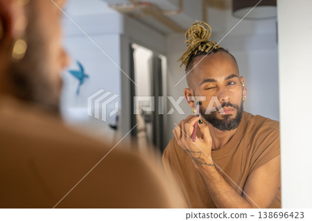 Bold Beauty: Black Gay Man Embracing Makeup 138696423