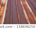 Galvanized roof rust. highlighting the material durability and weathering effects. 138698250