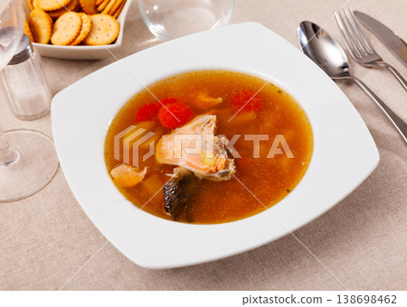Soup of salmon collar and fin with potatoes and carrot 138698462