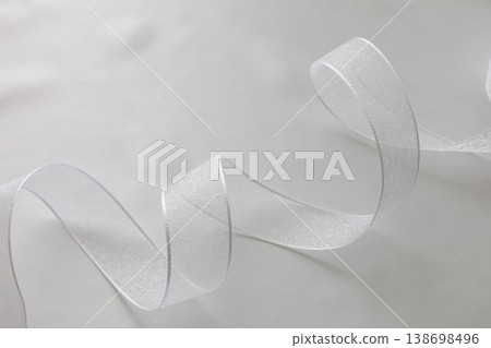 White fabric and ribbon White fabric and ribbon 138698496