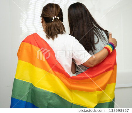 Asian couple woman with LGBT rainbow flag. 138698567