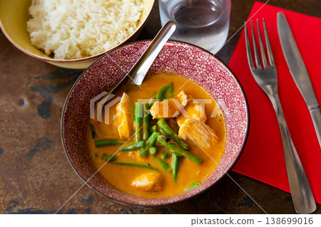 Red curry chicken with vegetables served with rice Red curry chicken with vegetables served with rice 138699016
