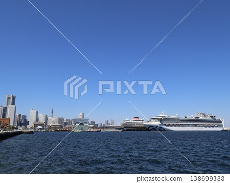 The Asuka III and Diamond Princess cruise ships docked at Osanbashi Pier. The Asuka III and Diamond Princess cruise ships docked at Osanbashi Pier. 138699388