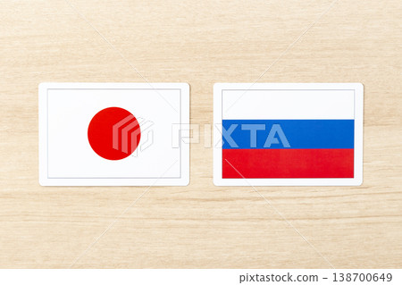 Japanese and Russian flags placed on the table 138700649