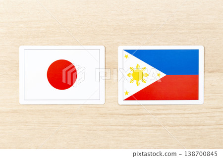The flags of Japan and the Philippines are placed on the table. The flags of Japan and the Philippines are placed on the table. 138700845