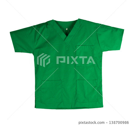 Green scrubs uniform isolated on white background with copy space. Green shirt with pockets for veterinarians, doctors, dentists, or nurses. Medical uniform. Medical clothes. Surgeon scrubs uniform. Green scrubs uniform isolated on white background with copy space. Green shirt with pockets for veterinarians, doctors, dentists, or nurses. Medical uniform. Medical clothes. Surgeon scrubs uniform. 138700986