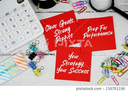 Clear Goals, Strong Profits, Prep For Performance, Your Strategy, Your Success text written on paper note with calculator and magnifying glass on wooden background Clear Goals, Strong Profits, Prep For Performance, Your Strategy, Your Success text written on paper note with calculator and magnifying glass on wooden background 138701190