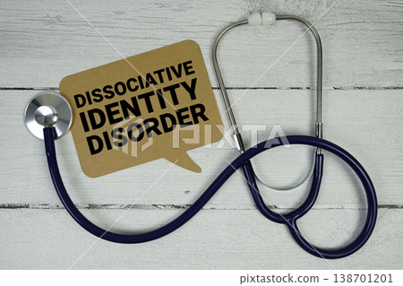 Dissociative Identity Disorder text with Medical Stethoscope on wooden background Dissociative Identity Disorder text with Medical Stethoscope on wooden background 138701201