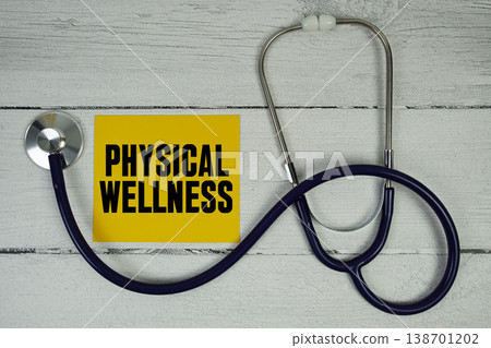 Physical Wellness text with Magnifying glass and Medical Stethoscope on wooden background Physical Wellness text with Magnifying glass and Medical Stethoscope on wooden background 138701202