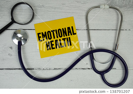 Emotional Health text with Magnifying glass and Medical Stethoscope on wooden background Emotional Health text with Magnifying glass and Medical Stethoscope on wooden background 138701207